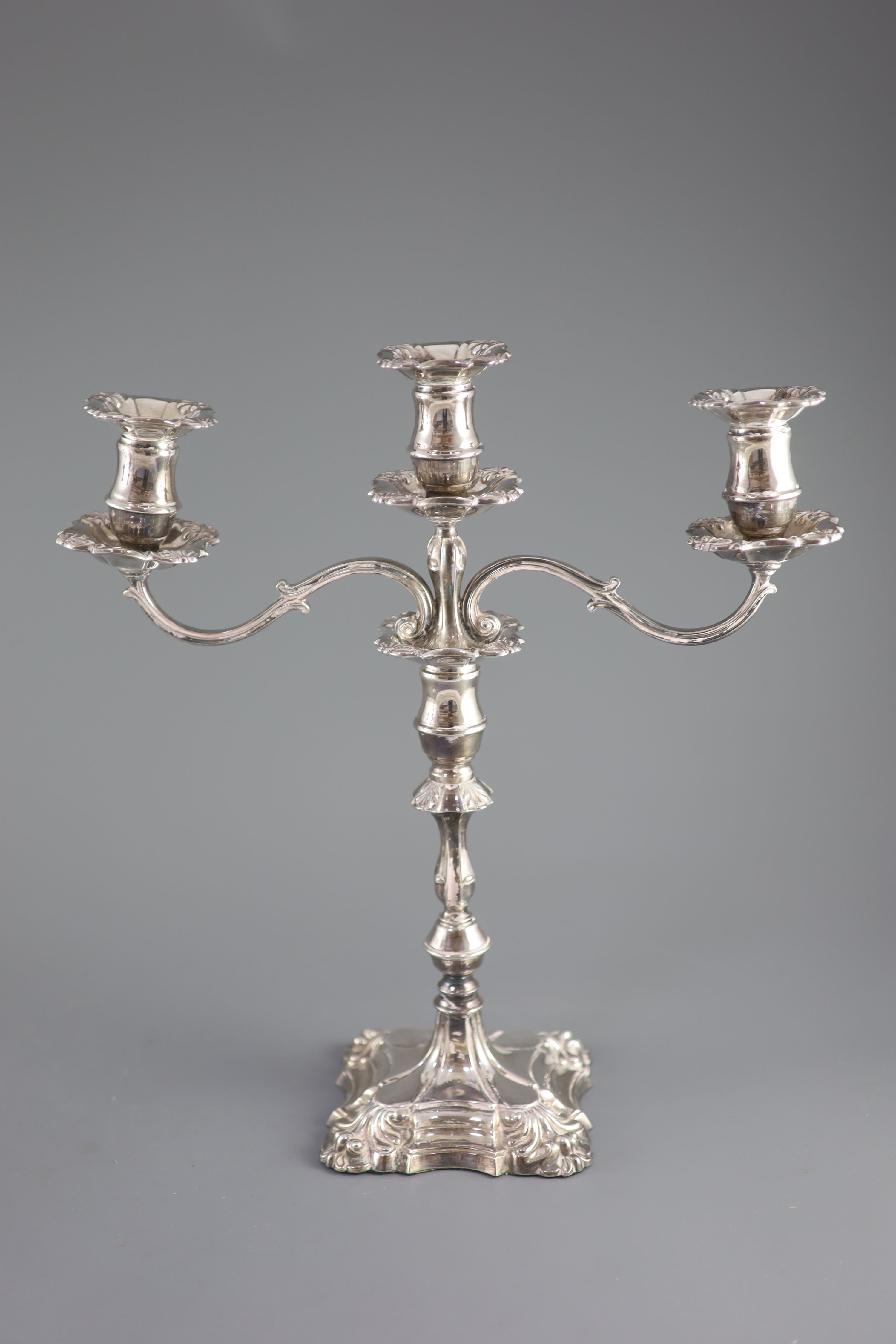 A modern pair of silver two branch, three light candelabra by Roberts & Belk